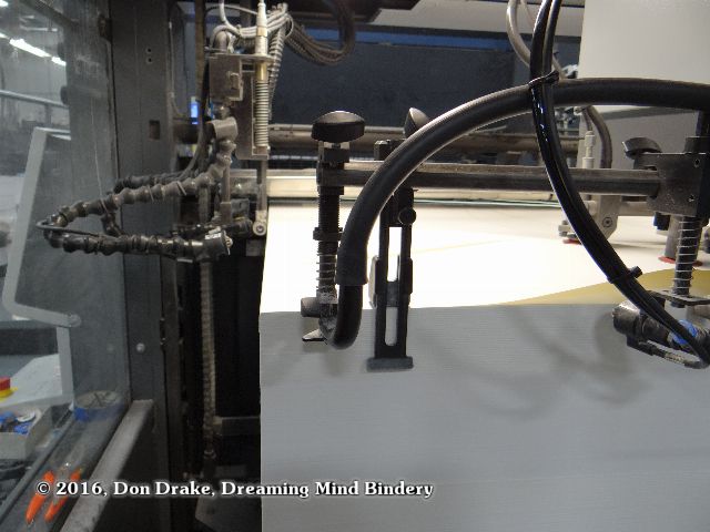 Paper feed mechanism on a Heidelberg Press at Amp Printing in Pleasanton, CA
