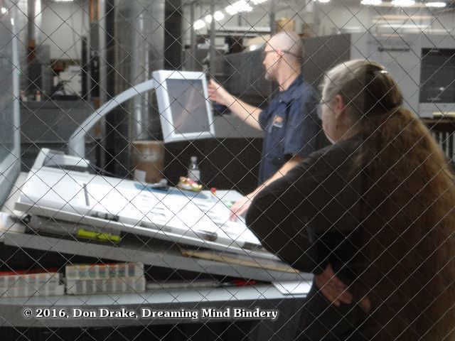 Kate Jordahl and Quentin Eckman at a press check for One Poem Books 5 & 6 at Amp Printing in Pleasanton