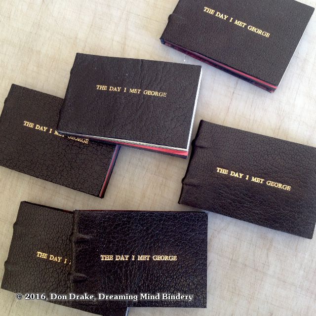 6 copies of the leather bound edition of Don Drake's short story and flip book "The Day I Met George".