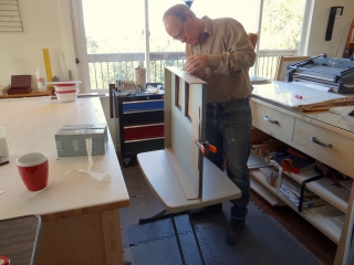 Using an adjustable height table to bring a project to a comfortable working height